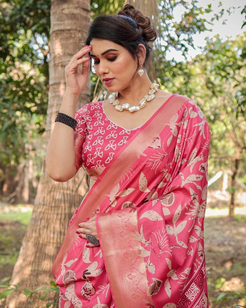 Vibrant Pink Tussar Silk Saree with Intricate Zari Border and Modern Floral Pallu